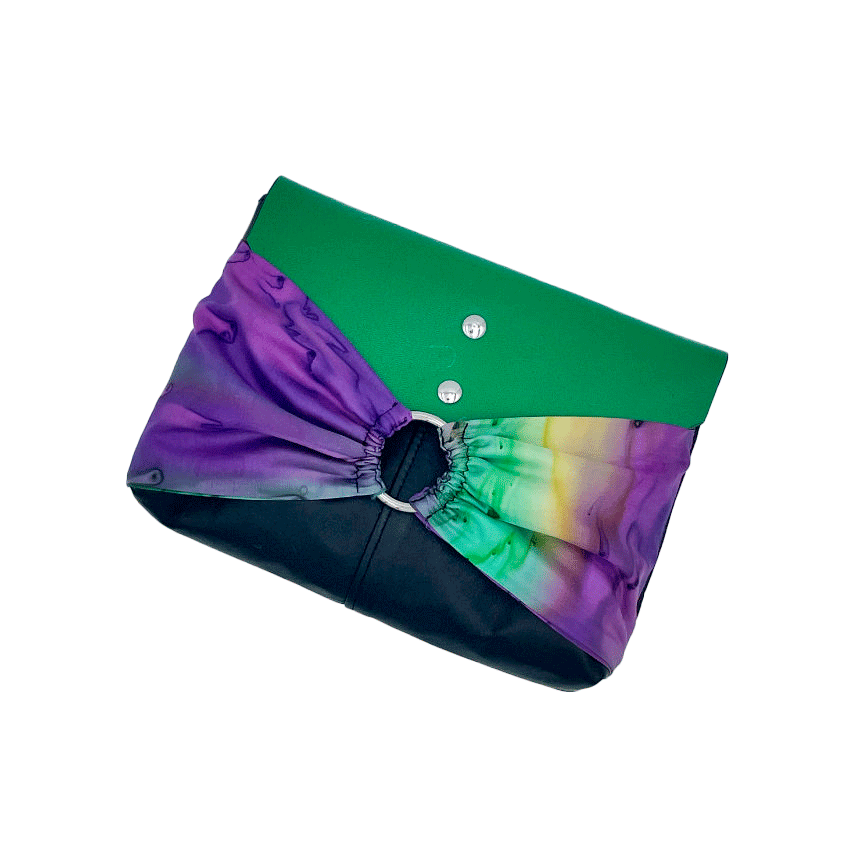 A flap clutch sewn in a yellow, green, and purple silk chiffon and paired with black, green, and yellow leathers.