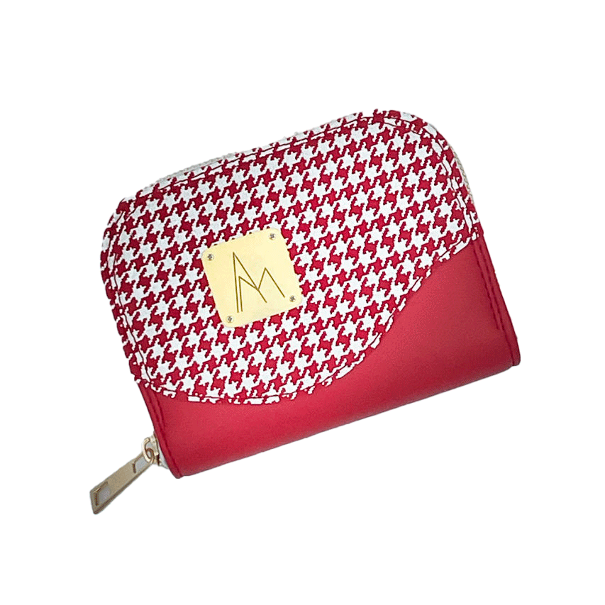 A zipped card-and-coin wallet made from red leather and a red leather printed with white houndstooth, with a red Sonia Rykiel branded lining.