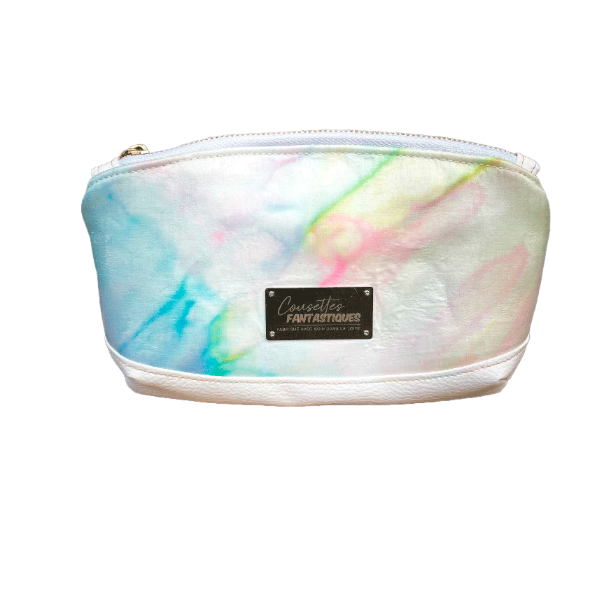 A small zippered pouch made of white faux leather and a hand-painted silk scarf.