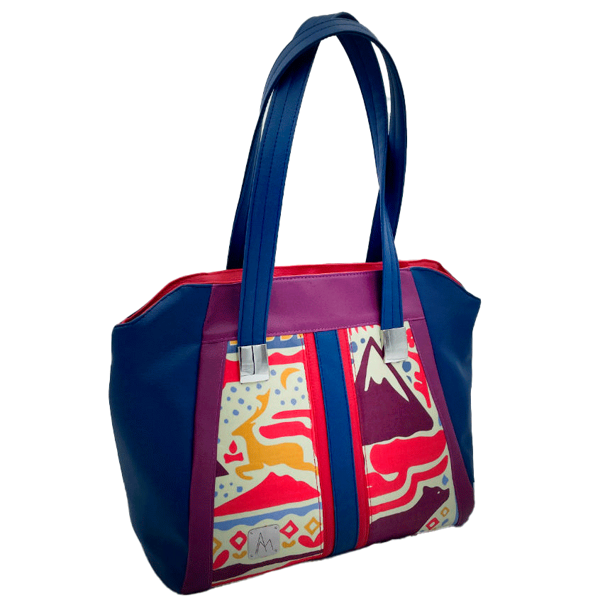 A shoulder bag made from a silk scarf with Scandinavian folklore patterns, combined with red, blue, and purple faux leathers.