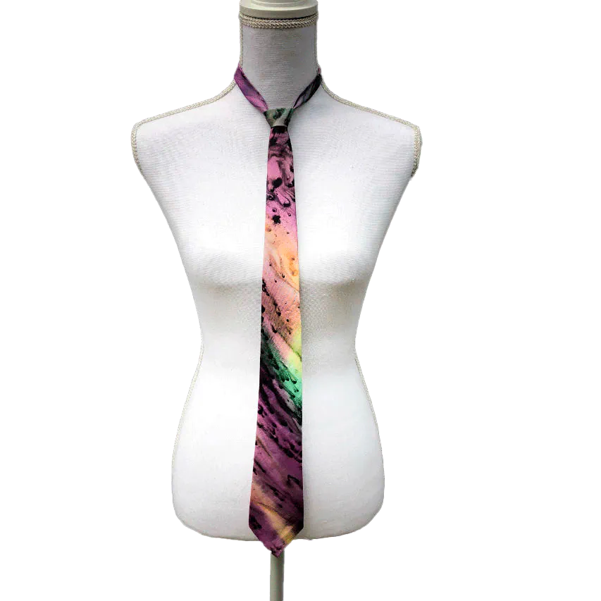 A tie made of blue, green, and purple silk chiffon, lined with taupe ramie.