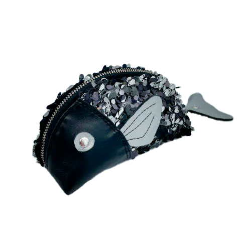 A zippered pouch sewn with black faux leather, black and white sequined fabric, and gray denim.