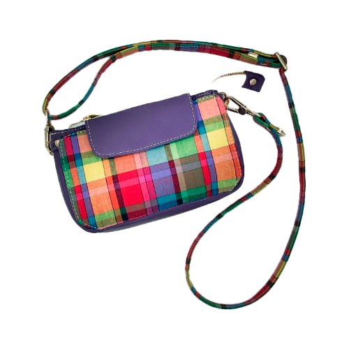 A hybrid clutch wallet bag made of purple leather and multicolored madras fabric.