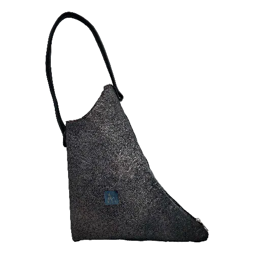 A handbag made of metallic leather with an iridescent red satin lining.