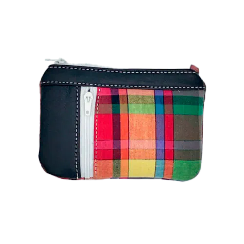 A mini zippered coin purse made from a patchwork of different materials: multicolor checkered madras and black lambskin leather.