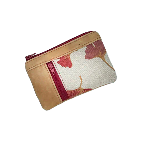 A mini zippered coin purse made of camel colored leather and a red Ginkgo Biloba leaves patterned polycotton canvas.