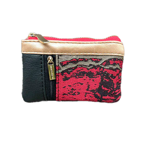 A mini zippered coin purse made from black, gold, and red faux leather and a wrap fabric in matching tones with a marbled pattern.