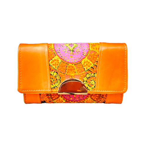 A wallet made of orange lambskin leather and vintage multicolored rayon, in shades of orange, yellow, and pink.