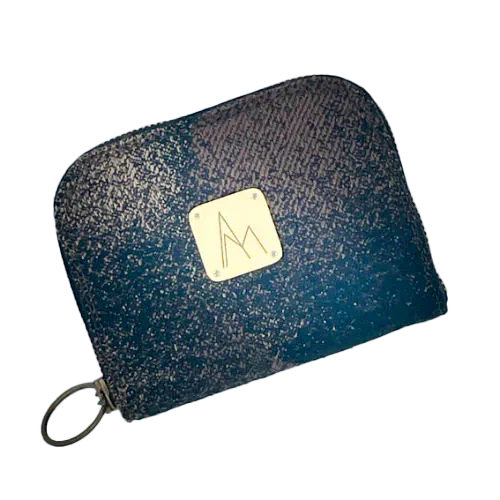 A small zippered card and coin wallet made with black, brown, and beige babywearing fabric featuring an abstract round pattern.