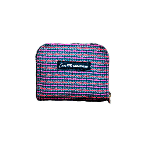 A small zippered card and coin holder made of gray fabric embroidered with shiny pink and red lines, with a textured gray matte interior.