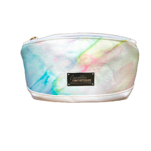 A small zippered pouch made of white faux leather and a hand-painted silk scarf.