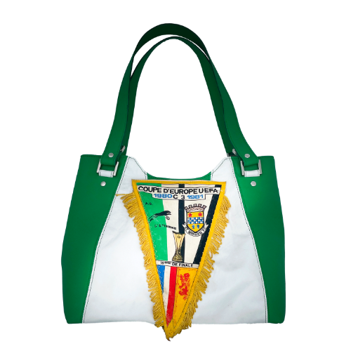 A shoulder bag made of green and white leathers, a vintage sports pennant, and a green-and-white lining.