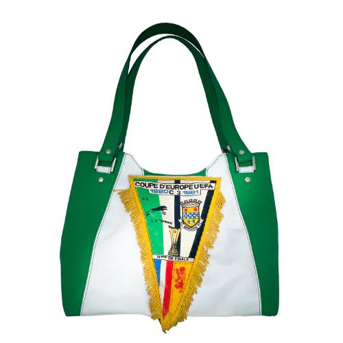 A shoulder bag made of green and white leathers, a vintage sports pennant, and a green-and-white lining.