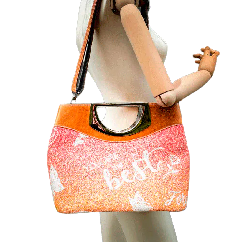 A shoulder bag made of caramel cowhide leather and a gradient-colored babywearing wrap with motivational texts and icons in white.