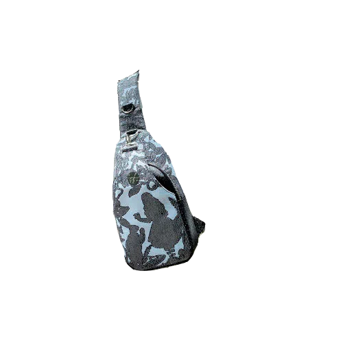 A backpack made from multicolored glitter canvas and a gray-blue, black, and silver-glitter woven wrap with a motif inspired by the Alice in Wonderland story.
