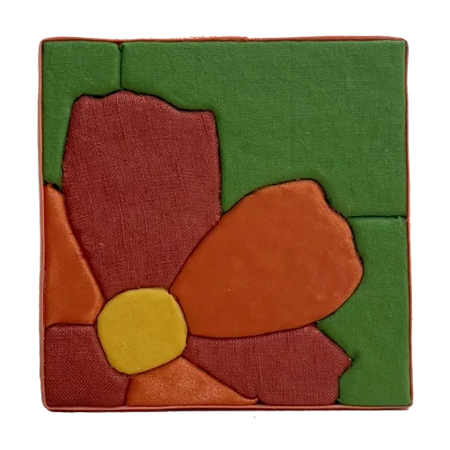 10 × 10 cm Kinusaiga textile picture of a very tightly framed flower: red and orange petals, yellow heart, on a green background, edged with orange bias tape.