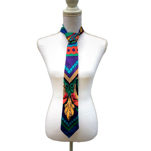 A tie made from black and gold woven wrap, marbled pattern.