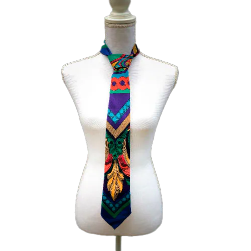 A tie made from black and gold woven wrap, marbled pattern.