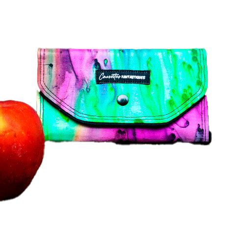 A wallet made from blue, green, and purple pure silk combined with black lambskin on the outside and taupe poplin on the inside.