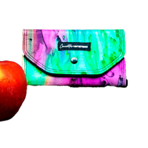 A wallet made from blue, green, and purple pure silk combined with black lambskin on the outside and taupe poplin on the inside.