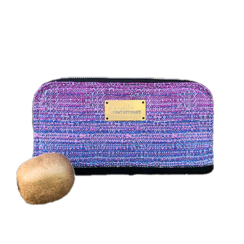 A cardholder and zippered coin purse made from a gradient mirror wrap from pink to blue and black cork.