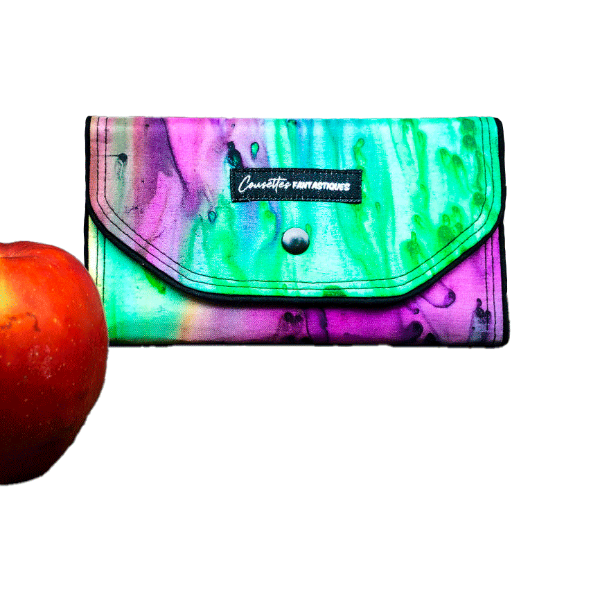 A wallet made from blue, green, and purple pure silk combined with black lambskin on the outside and taupe poplin on the inside.
