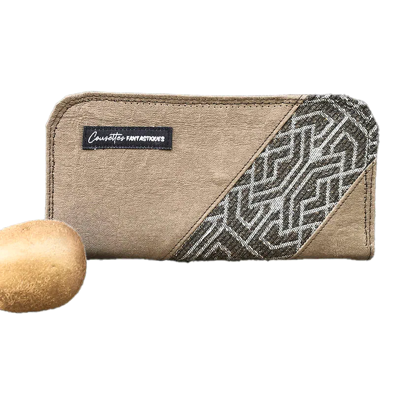 A zipped wallet and cardholder made of chocolate brown washable paper, baby wrap fabric in brown and beige tones, and yellow poplin.