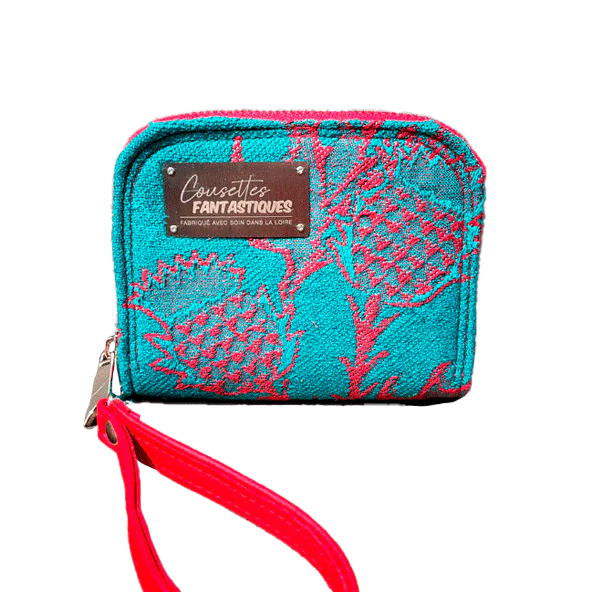 Un petit porte-cartes-et-monnaie zippé fabriqué en tissu d'écharpe rouge sang et vert émeraude avec des motifs de chardons, et de la toile de lin vert émeraude. Livré avec une dragonne en simili rouge vif.