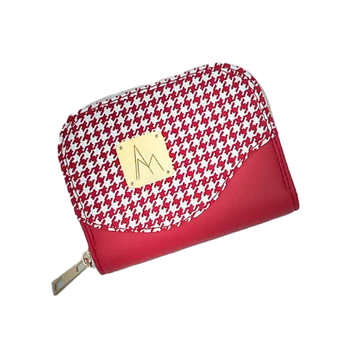 Un porte-cartes-et-monnaie zippé fabriqué à partir d'un cuir rouge et d'un cuir rouge imprimée pied de poule blanc, avec une doublure rouge siglée Sonia Rykiel.
