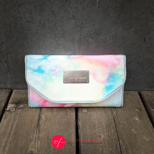 A wallet made from a hand-painted silk scarf and bubblegum pink poplin.