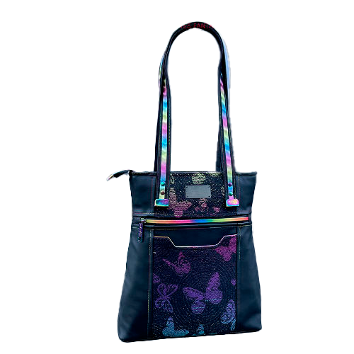 Anses bicolores/bi-matières, bouclerie luxe coloris arc-en-ciel, simili de récup' au toucher velours, et écharpe de portage au motif fantaisiste.